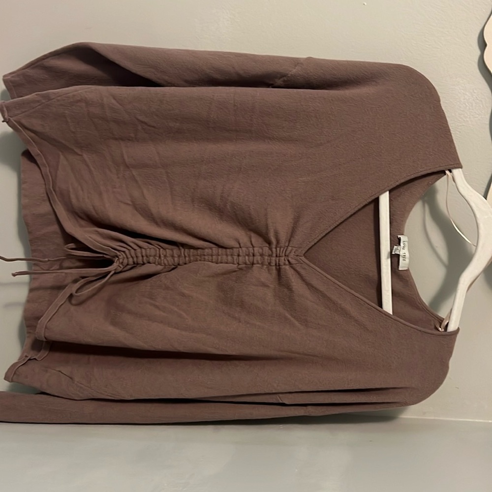 V neck cinched with tie sweater